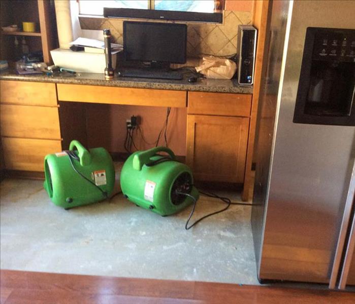 Drying equipment in kitchen.