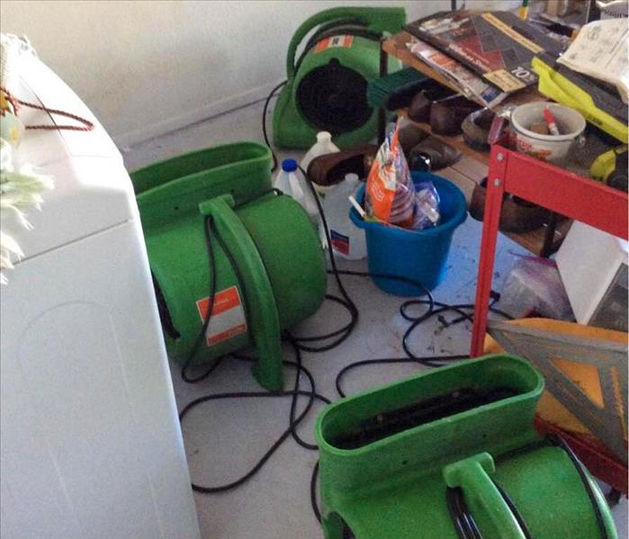 Drying equipment set up in garage.