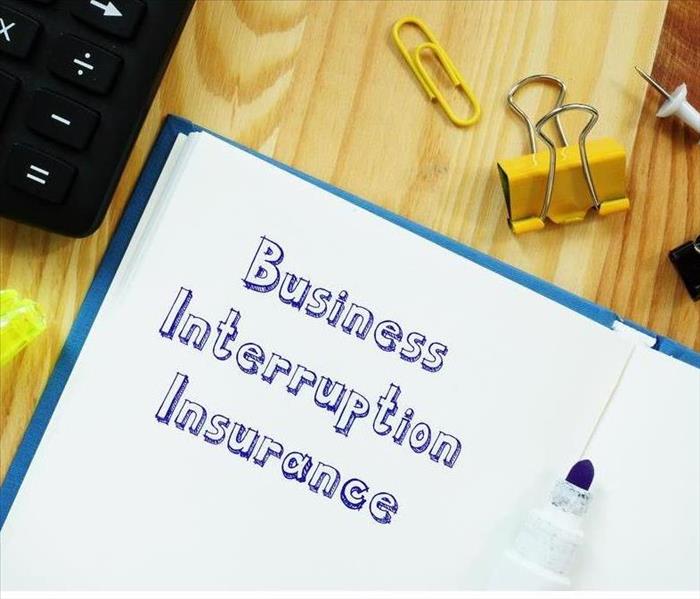 Financial concept meaning Business Interruption Insurance with sign on the piece of paper.
